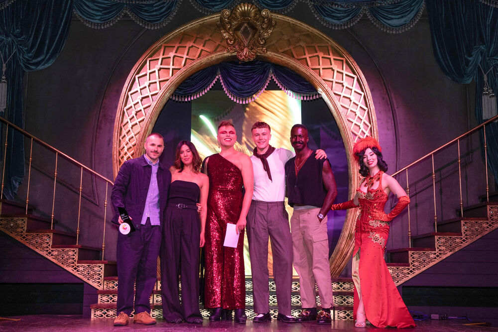 Winners on stage with the performers