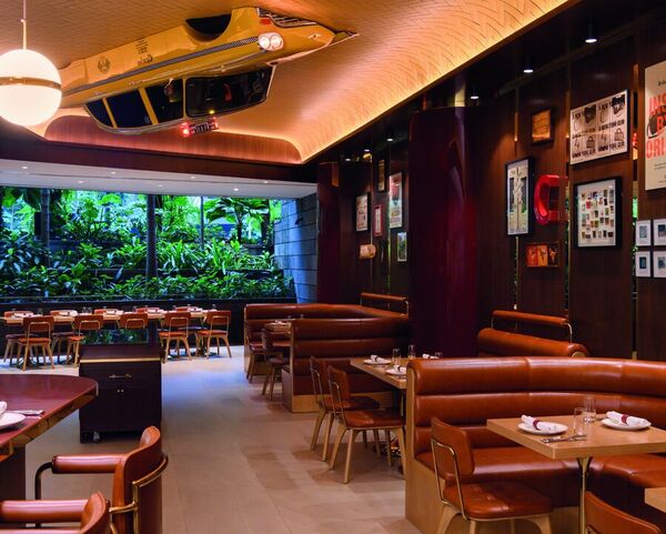 Leather booths in The Coach Restaurant at Jewel Changi Airport