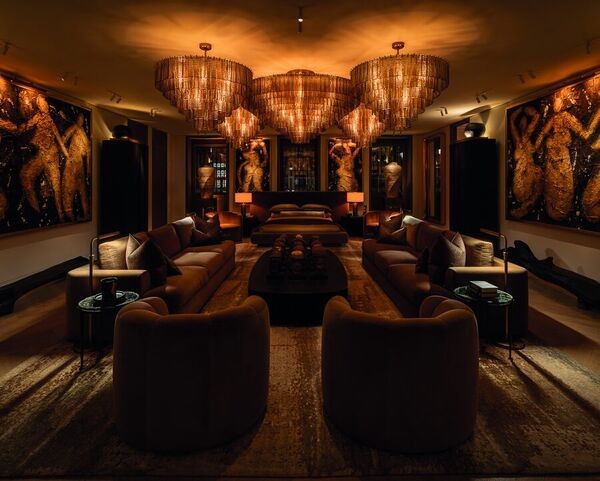 Chandeliers over the sofas in RH Paris, The Gallery on the Champs-&Eacute;lys&eacute;es