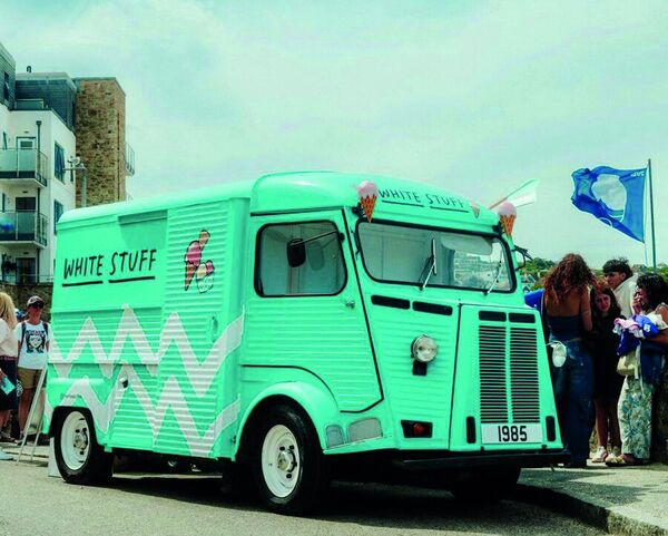 The mint-green White Stuff 40th birthday tour van